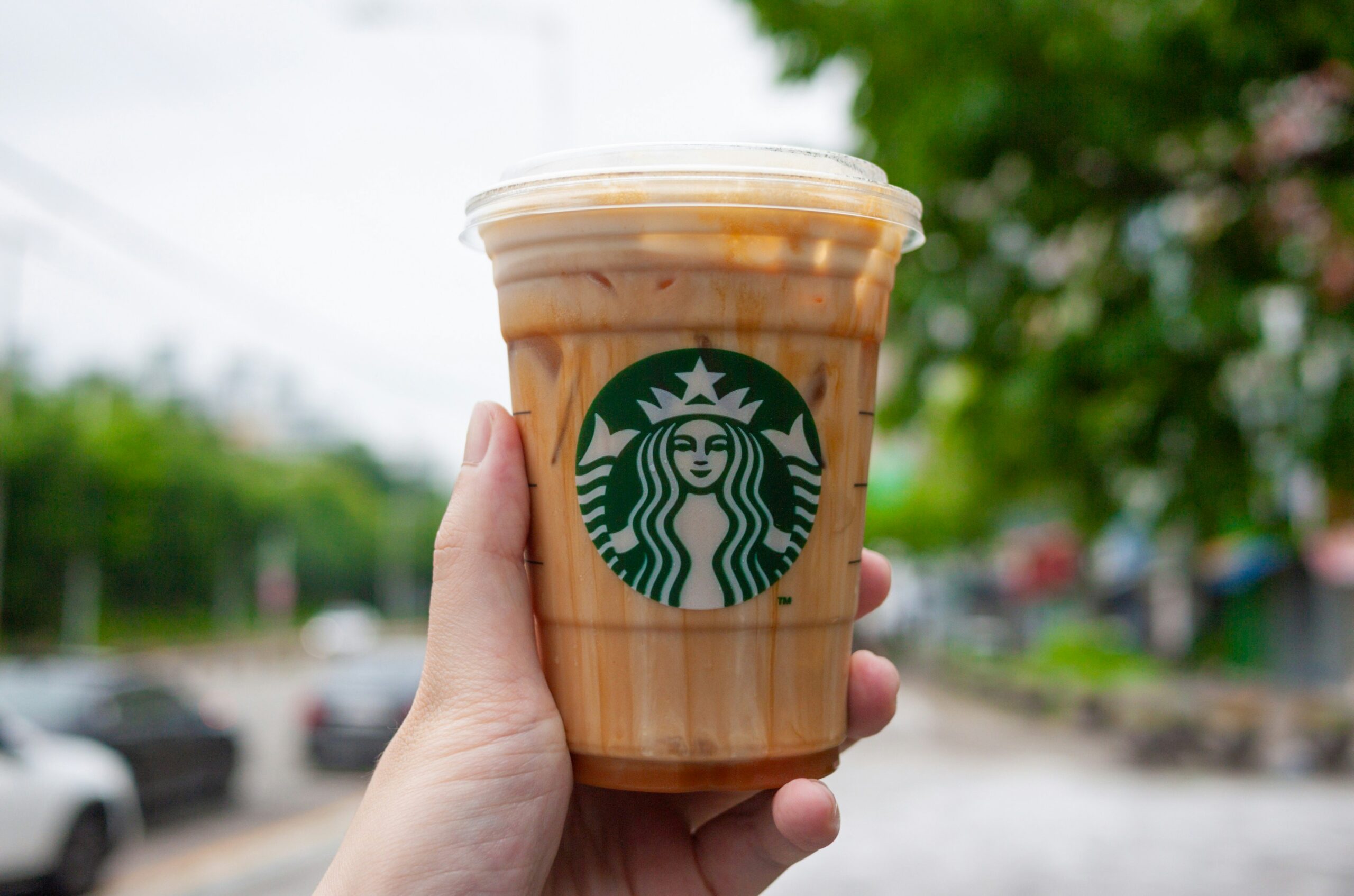 Starbucks Latte Flavors guide with classic, iced, and plant-based latte options.