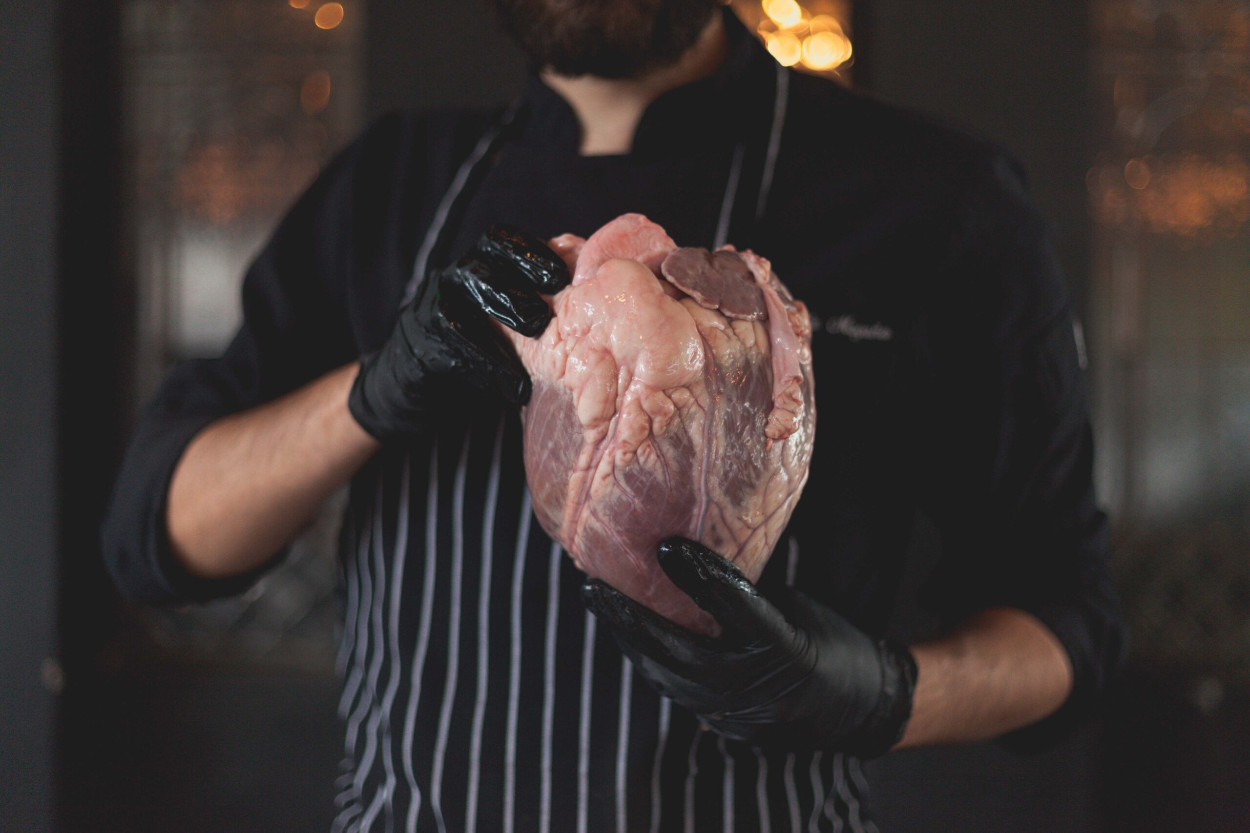 Why is the left ventricle thicker than the right and how the heart works